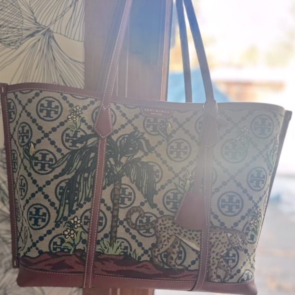 Tory Burch  three times. Have receipt, tags, and duster
Bag.